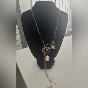 Artistic Gold Necklace with Pearl Details